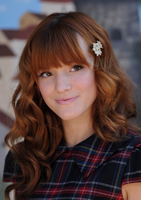 http://hairstylesweekly.com/images/2012/07/Cute-Long-Hairstyle-with-Bangs-from-Bella-Thorne.jpg