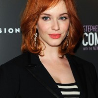 Medium Fiery Red Wavy Hairstyle for Women