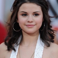 Selena Gomez Cute Braided Half Up Half Down Hairstyle for Girls