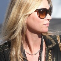 Side View of Medium Layered Blonde Hairstyle