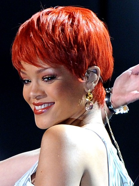 Rihanna Short Haircut: Gorgeous Red Pixie for Summer Days/Getty Images
