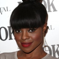 Top Knot Hairstyle with Bangs for Black Women