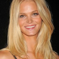 Long Blonde Wavy Hairstyle with Tousled Layers