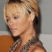 Rihanna French Twist Updo Hairstyle with Wispy Bangs