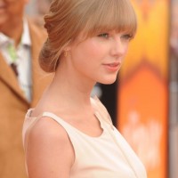 Taylor Swift Romantic Loose Updo Hairstyle with Blunt Bangs