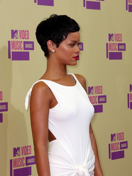 Side View of Rihanna Short Curly Hairstyle