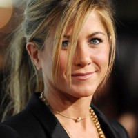 Jennifer Aniston Relaxed Ponytail with Loose Tendrils