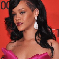 Rihanna Long Hairstyles: Black Wavy Hairstyle with Bangs