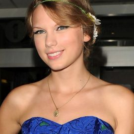 Taylor Swift Cute Loose Updo With Bangs