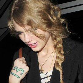 Taylor Swift Long Loose Braided Ponytail Hairstyles