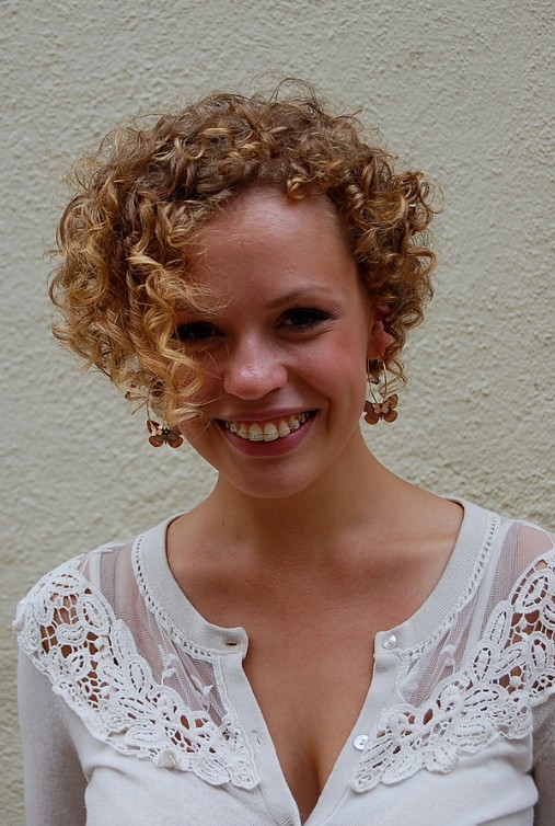 Asymmetric Short Curly Hairstyle for Women