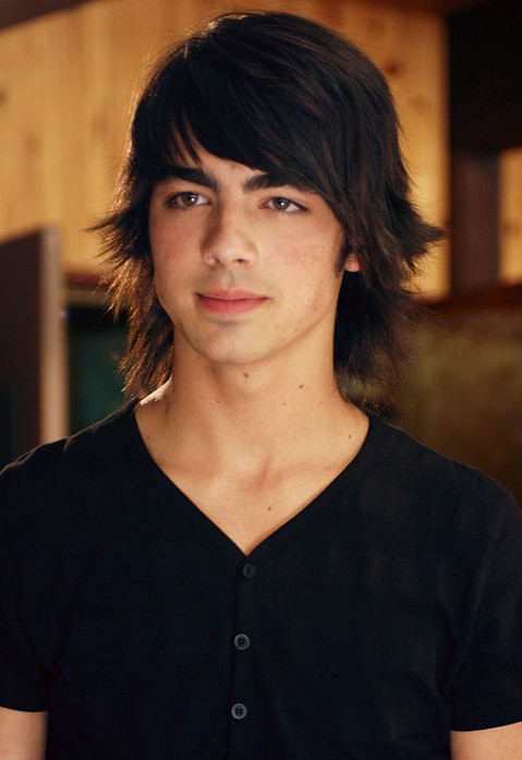 Joe Jonas Layered Hairstyle with Side Swept Bangs 