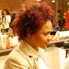 Side View of African American Curly Red Hairstyle