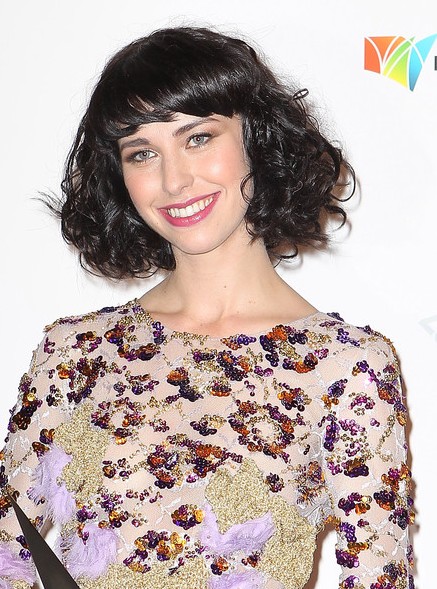 Kimbra Hairstyles: Short Black Curly Hairstyle with Bangs 