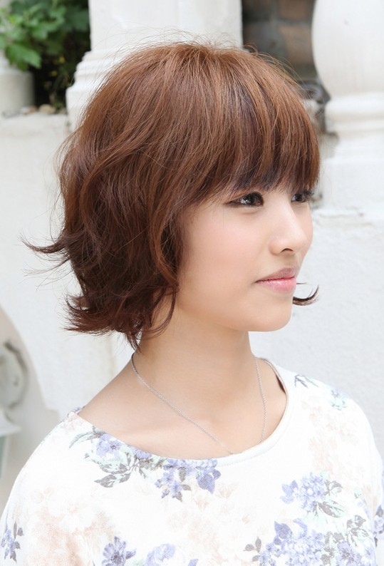 Image of Curly bangs with layered bob asian hairstyle