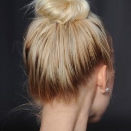 Messy Topknot with Dark Roots
