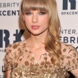 Taylor Swift Lovely Long Curly Hairstyle with Bangs