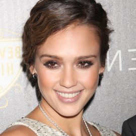 Jessica Alba side parted soft wavy hairstyle