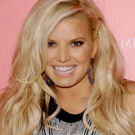 Jessica Simpson Side Parted Long Blonde Wavy Hairstyle