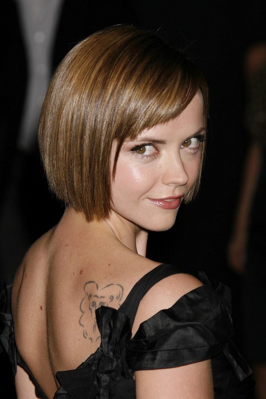 Layered Curly Hairstyle with Side Swept Fringes - Helen Hunt's