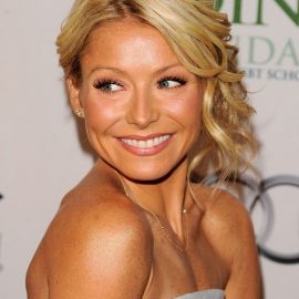 Messy blonde updo for women - Kelly Ripa's Hairstyle