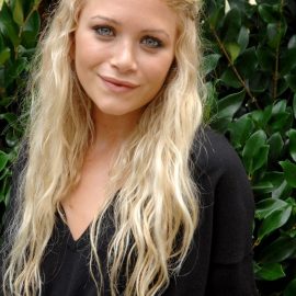 Long blonde tousled curly hairstyle 2014 - Mary Kate Olsen hairstyles