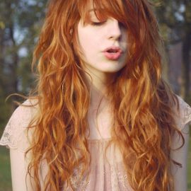 Orange Long Wavy Hairstyle with Messy Bangs