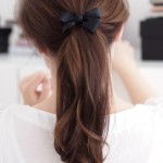 Demure Tousled Pony Tail with Elegant Ribbon Bow
