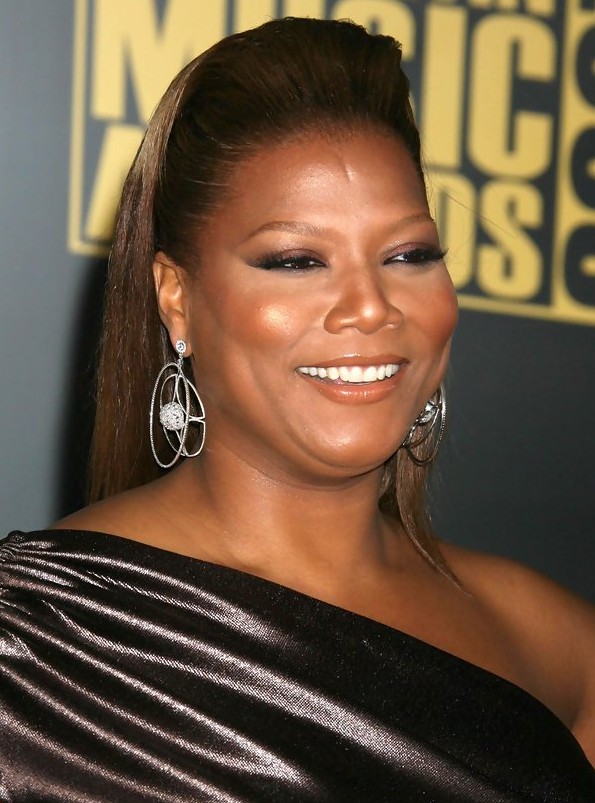 Queen Latifah's 1960s Retro Hairstyle for Long Hair