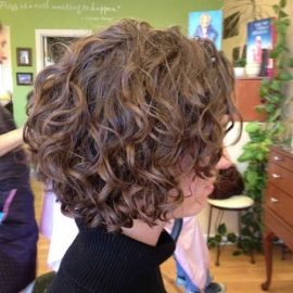 Short curly bob hairstyle for women age over 30