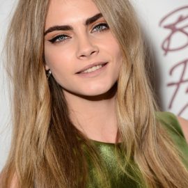 Cara Delevingne Long Center Part Hairstyle for 2016