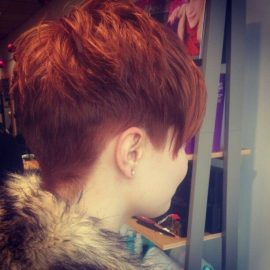 Redhead - chic layered short pixie cut for winter