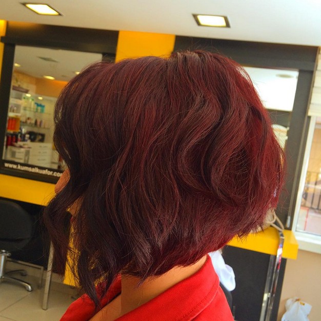 short red wavy stacked bob hairstyle for thick hair