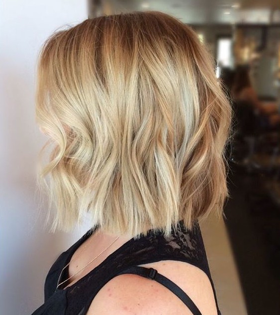 Side View Of Layered Choppy Bob Hairstyle For Thick Hair