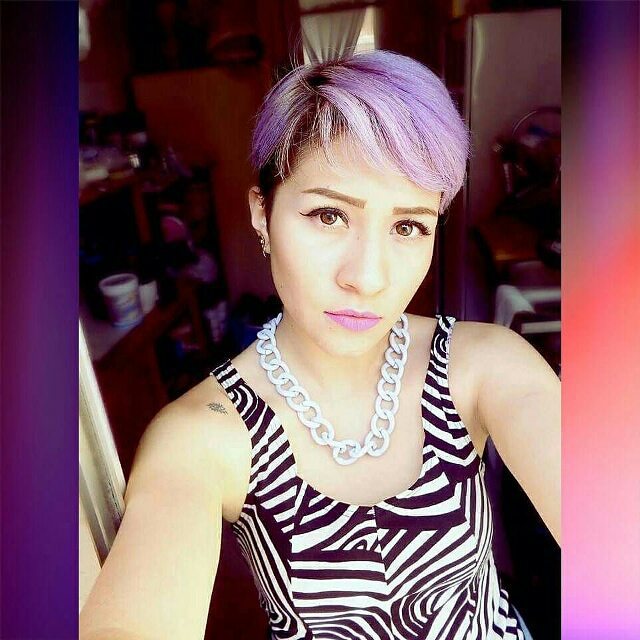 trendy short purple pixie haircut with bangs