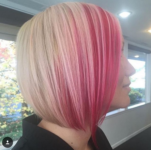 bob haircut with pink highlights