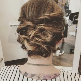 Messy updo using twists and topsy tails combined!