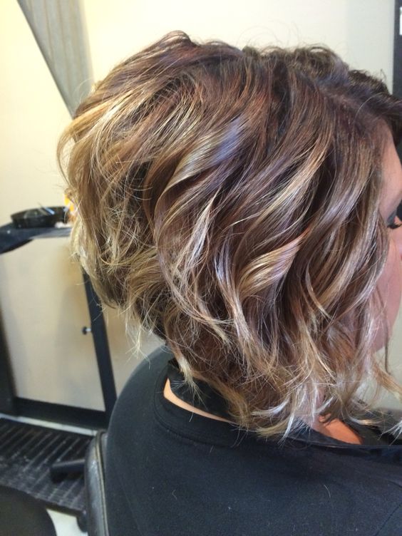 short curly stacked haircut