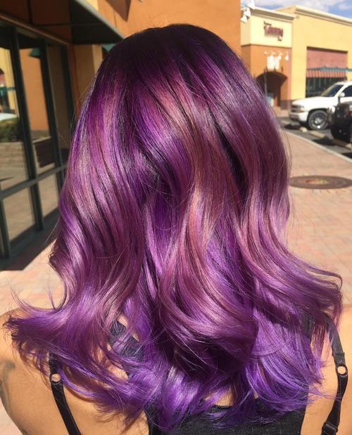 Dark Purple Hair with rick magenta highlights