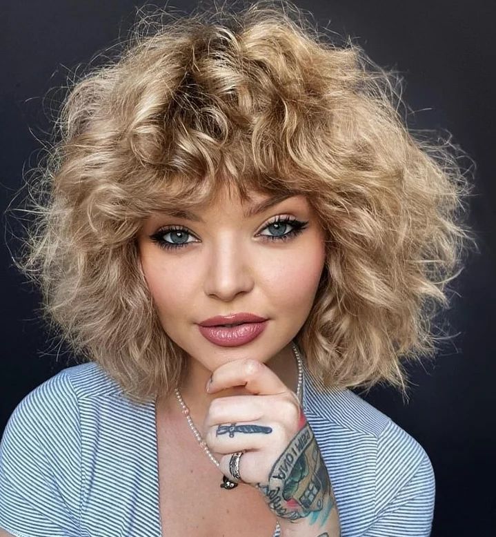 Best curly hairstyles – quirky bouffant bob