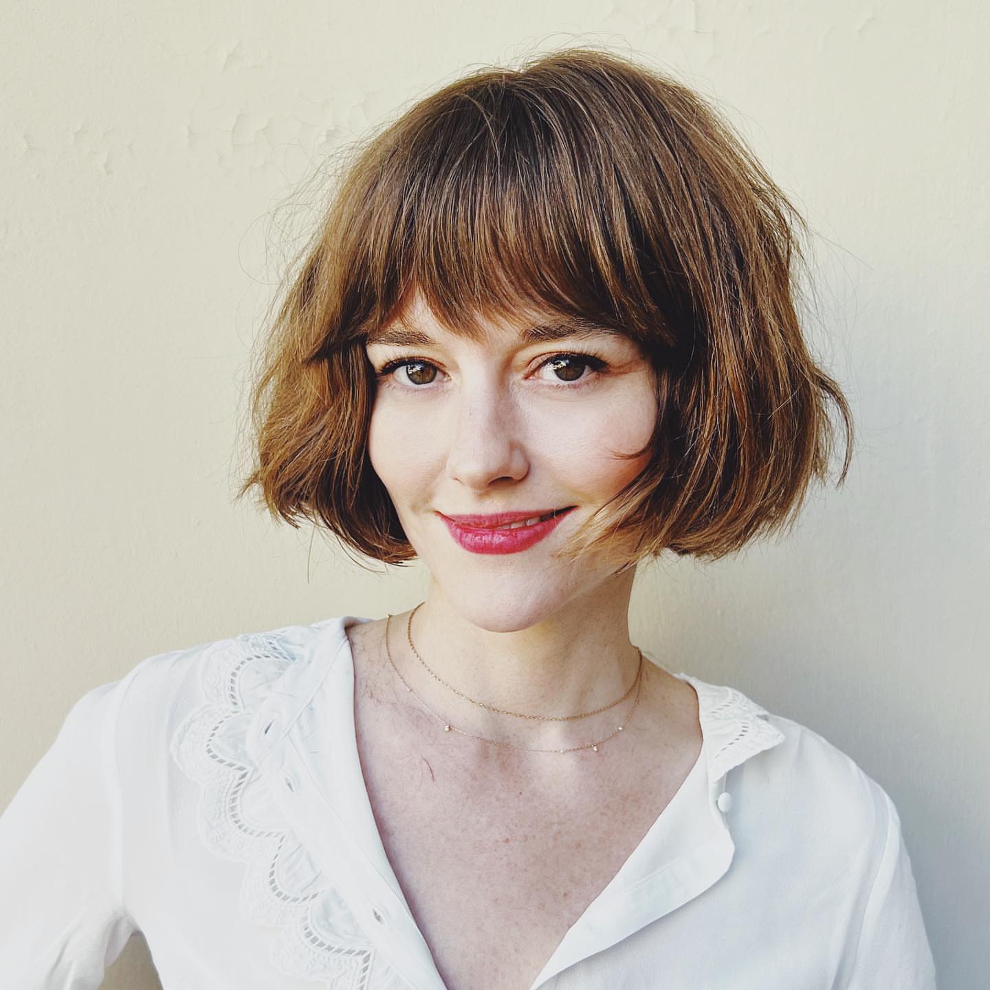 short bob cut with feather bangs