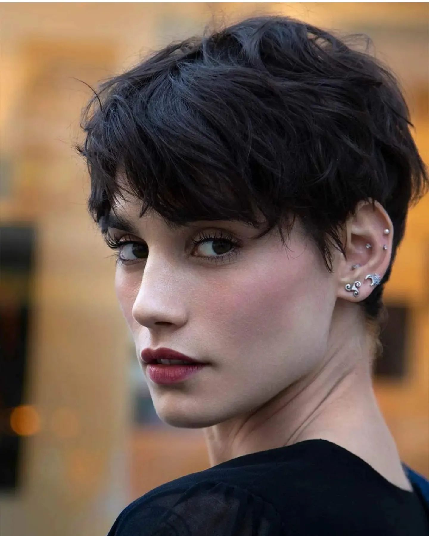 short wavy curly pixie haircut