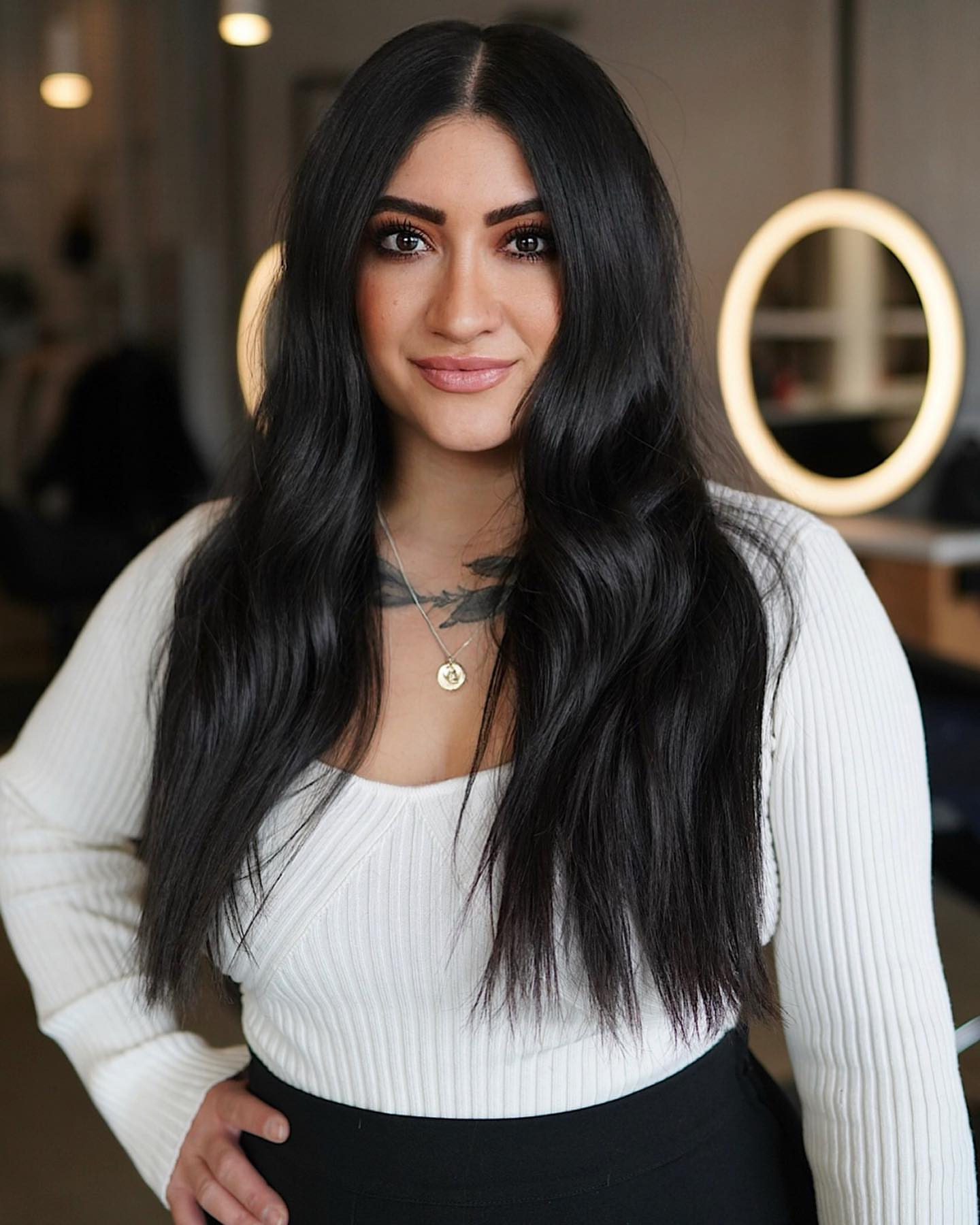 center parted long black hair with waves