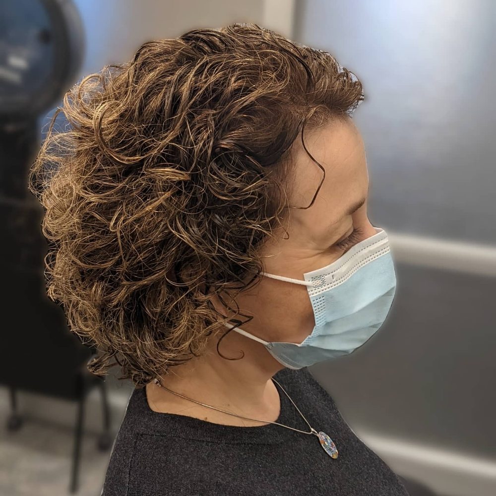 Short Curly Bob with Subtle Highlights